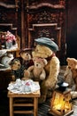 Vintage teddy bear family sitting at the tea table Royalty Free Stock Photo