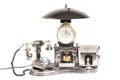 Vintage telephone, antique clock with lamp isolated on white Royalty Free Stock Photo