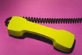 Vintage telephone handset. phone receiver on red background. old communication technology. copy space Royalty Free Stock Photo