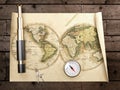 Vintage telescope on antique map Royalty Free Stock Photo