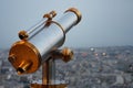 Vintage Telescope looking over city