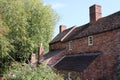 Vintage terrace houses view from rear garden, sky and trees visible