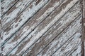 Vintage texture, old background with wooden boards with cracked, peeled paint, rough textured surface close-up. Royalty Free Stock Photo