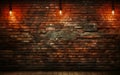 Vintage textured red brick wall with spotlight shining in the center ideal for backgrounds or as a grunge design element Royalty Free Stock Photo