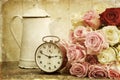 Vintage textured still life with roses and alarm clock