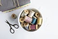 Vintage thread spools, scissors and cotton fabrics Royalty Free Stock Photo