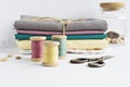 Vintage thread spools, wooden buttons, scissors and fabrics