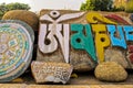 Vintage Tibetan mani prayer stones at Mahabodhi Temple,