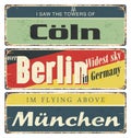 Vintage tin sign collection with Germany cities. Berlin. Munich. Cologne. Retro souvenirs.