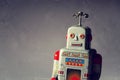 Vintage tin toy robot isolated, drone delivery artificial intelligence concept Royalty Free Stock Photo