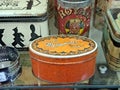 Vintage Tins in an Antique Mall, Orange Red and White, Candy Boxes, Retro Canisters in a Second Hand Shop, Thrifting Home Decor