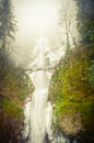 Vintage tone icy Multnomah Falls Oregon in wintertime Royalty Free Stock Photo