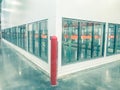 Vintage tone row of empty commercial fridges at wholesale big-box store