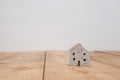 Vintage tone of wooden toy house - home purchase mortgage concept