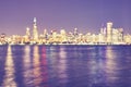 Vintage toned blurred Chicago city lights at night. Royalty Free Stock Photo