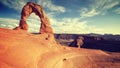 Vintage toned Delicate Arch at sunset. Royalty Free Stock Photo