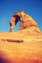 Vintage toned Delicate Arch at sunset. Royalty Free Stock Photo