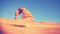 Vintage toned Delicate Arch at sunset. Royalty Free Stock Photo