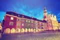 Vintage toned Old Market Square in Poznan at night. Royalty Free Stock Photo