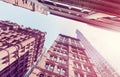 Vintage toned old and new buildings in Manhattan at sunset, NYC. Royalty Free Stock Photo