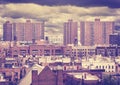 Vintage toned photo of New York residential buildings, Harlem. Royalty Free Stock Photo