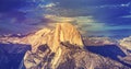 Vintage toned sunset above Half Dome rock in Yosemite. Royalty Free Stock Photo