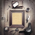 Vintage tools of barber shop with canvas in picture frame Royalty Free Stock Photo