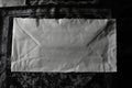 Vintage torn envelope on textured black and white background Royalty Free Stock Photo