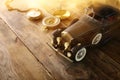 Vintage toy car, compass and old pocket watch Royalty Free Stock Photo