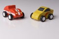 Vintage toy cars in a row on a white surface Royalty Free Stock Photo