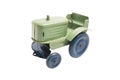 Vintage toy green metal tractor with blue wheels on white isolated background Royalty Free Stock Photo