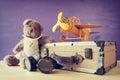 Vintage toy plane and cute teddy bear Royalty Free Stock Photo