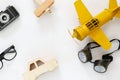 vintage toy plane, old photo camera and pilot glasses Royalty Free Stock Photo