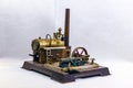 Toy steam engine factory on white background Royalty Free Stock Photo