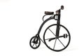 Vintage toy velocipede isolated in white