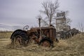 Vintage tractor with the Coderre, Saskatchewan elevator in background