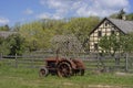 Vintage Tractor at an Old Farm Royalty Free Stock Photo