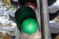 Vintage traffic light with a green light