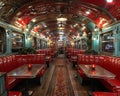 Vintage train car converted into a cozy diner with booth seating and period details. Royalty Free Stock Photo