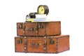 Vintage travel accessories - suitcases, clock, camera and books isolated on white background. Royalty Free Stock Photo