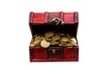 Vintage treasure chest full of golden coins isolated on white background Royalty Free Stock Photo