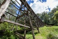Vintage trestle bridge in Australian eucalyptus forest. Royalty Free Stock Photo