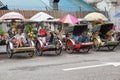 Vintage Trishaw stop beside road