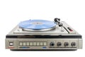 Vintage turntable record player with blue vinyl