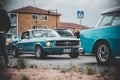 Vintage turquoise car during a cruising event