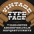 Vintage typeface. Retro distressed alphabet vector font. Slab serif letters and numbers.
