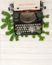 Vintage typewriter with christmas decoration Merry Christmas