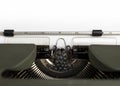 Vintage typewriter closeup. Blank paper sheet for copy space or add text Royalty Free Stock Photo