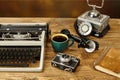 Vintage typewriter, cup of coffee,old telephone,camera and a not Royalty Free Stock Photo