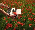 Vintage typewriter in hand, education, business, grammar. Royalty Free Stock Photo